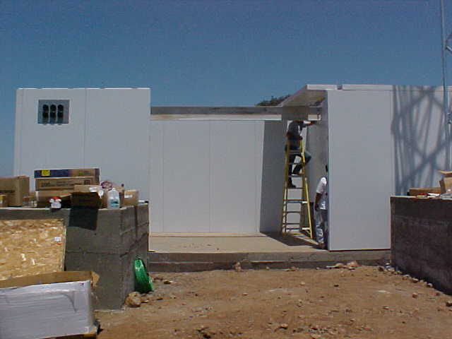 adding the roof to the building